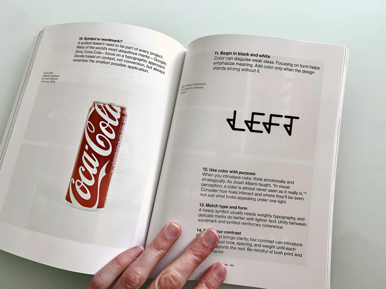 Open spread from Logo Design Love showing the Left wordmark under the principle Begin in black and white